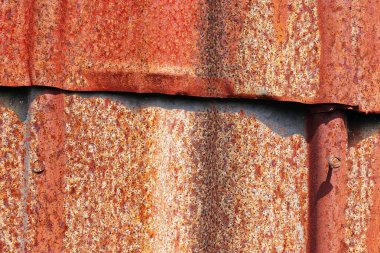 Yüksek çözünürlükte yıpranmış paslı metalin ayrıntılı yakın görünümü