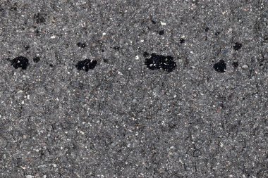 Farklı cadde ve yolların asfalt yüzeylerinde yakından bakıldığında detaylı görünüm