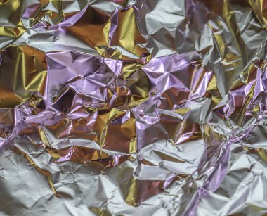 Bir alüminyum folyo yüzeyinin farklı renklerde kapalı dokusu