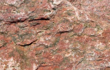 Granit taş dokusu yüksek çözünürlüklü detaylı bir yakın çekim görüntüsüyle.