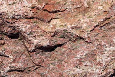 Granit taş dokusu yüksek çözünürlüklü detaylı bir yakın çekim görüntüsüyle.