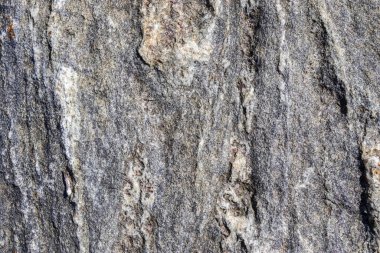 Granit taş dokusu yüksek çözünürlüklü detaylı bir yakın çekim görüntüsüyle.