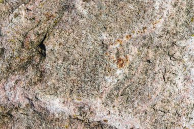 Granit taş dokusu yüksek çözünürlüklü detaylı bir yakın çekim görüntüsüyle.