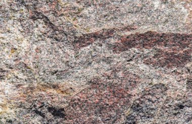 Granit taş dokusu yüksek çözünürlüklü detaylı bir yakın çekim görüntüsüyle.