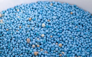 Arkaplan kullanımı için mavi kimyasal gübre dokusunu kapat