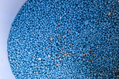 Arkaplan kullanımı için mavi kimyasal gübre dokusunu kapat