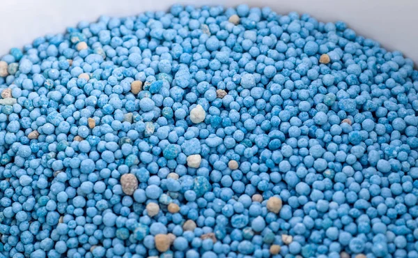 Arkaplan kullanımı için mavi kimyasal gübre dokusunu kapat