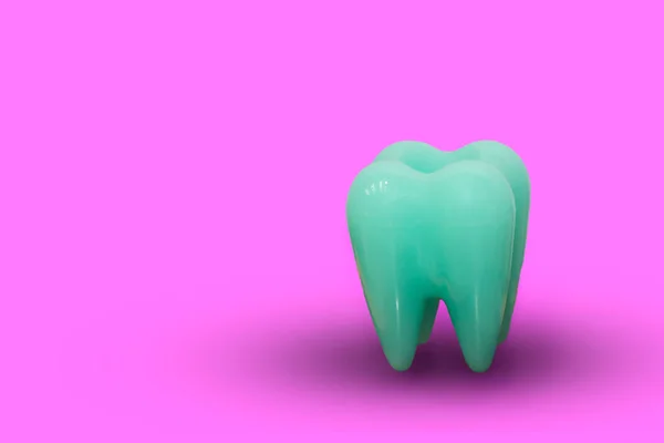 Tooth and dentist and pink background. — Stock Photo, Image