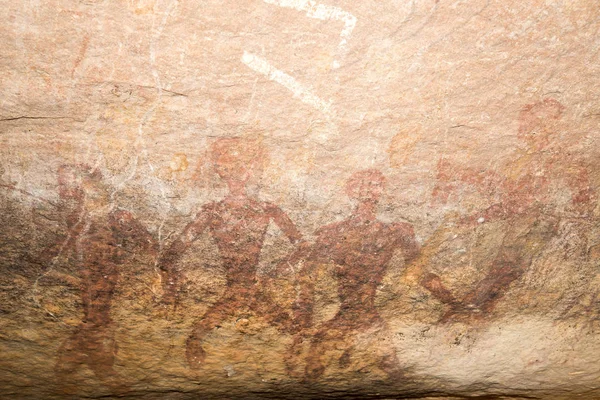 cave paintings on the wall, painted ocher rock.