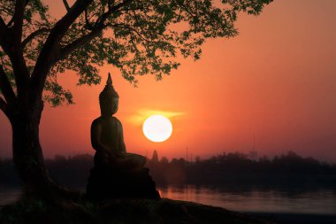 Water Reflection Silhouette of Buddha on sunset with mountain be clipart