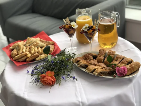 nonalcoholic buffet table with light snacks and canape in oficial event