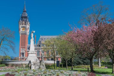 Calais, France - April 20th, 2018: beautiful city hall in spring, in the North of France clipart