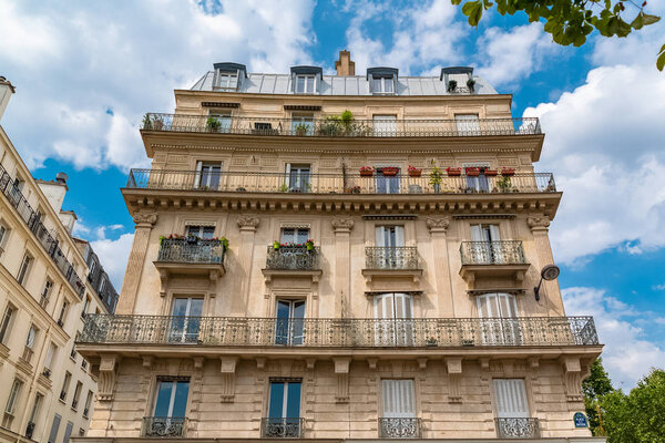 Paris, beautiful building in the center, typical parisian facade place de la Nation 
