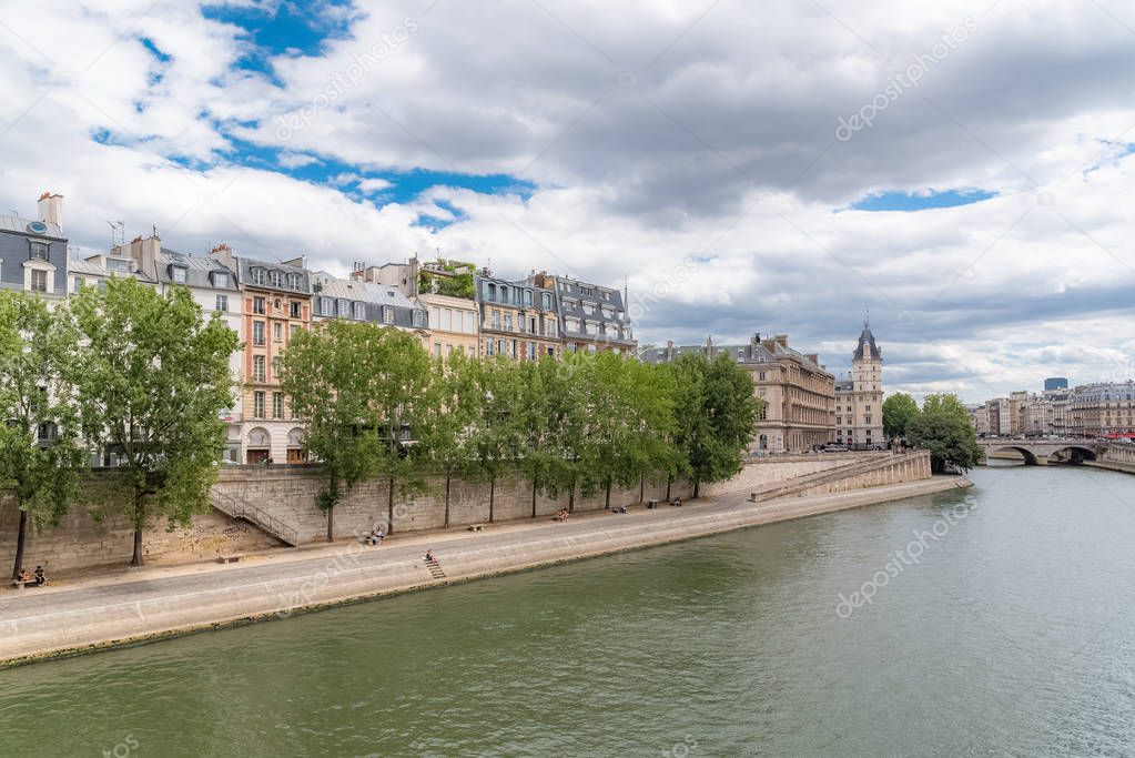 Paris, panorama of the pont au Change, the ile saint-louis and the quai des Orfevres, beautiful buildings and banks of the Seine 