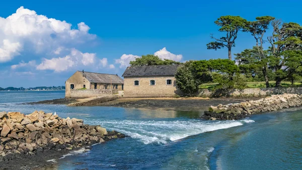 Berder island, in Brittany, in the Morbihan gulf, path covered by the sea at rising tide