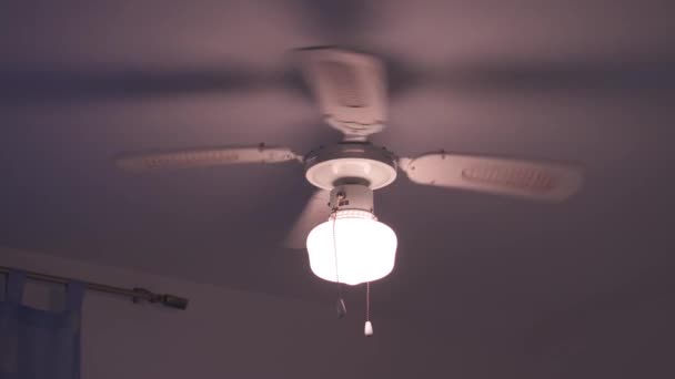The Ceiling Fan Rotates And Shakes With The Lamp On Stock Video