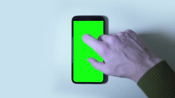 スマートフォンの緑の画面上のジェスチャー — ストック動画