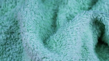 kıvrımlı ve kıvrımlı turkuaz rengi terry havlusu