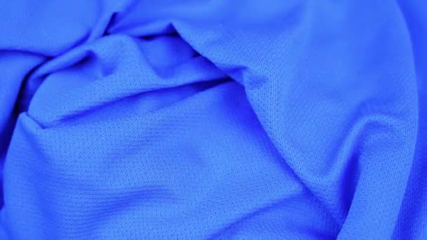 Bakgrund som ändrar färger med fashionabla blå sportkläder — Stockvideo