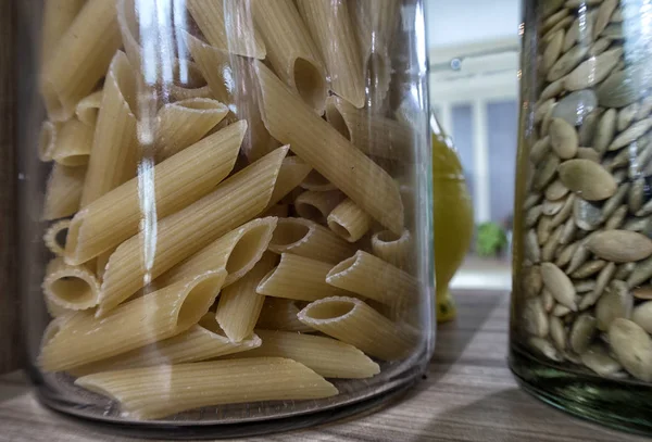 Various Uncooked Cereals Grains Beans Pasta Healthy Cooking Glass Jars — Stock Photo, Image