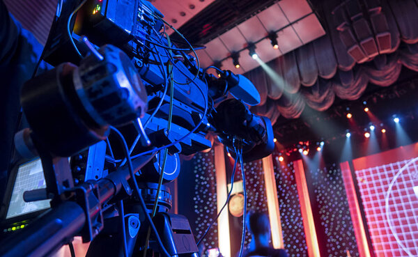 TV broadcast of the event from the theater.