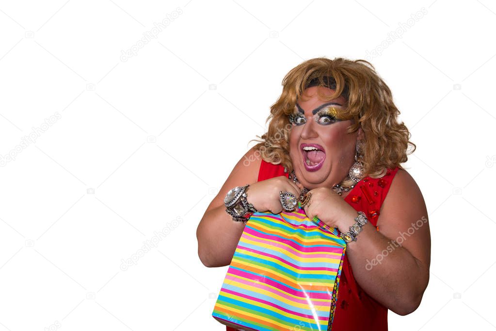 Funny travesty actor. Drag queen and gift. Fat man and make-up. Gift