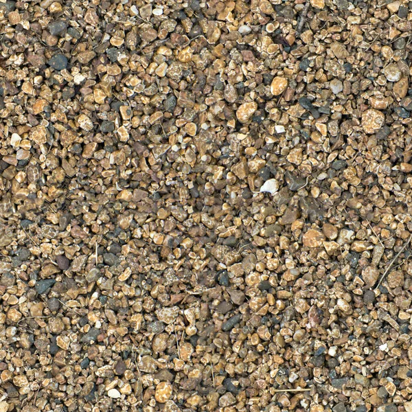 Små stenar med sömlös textur. Sömlös ytstruktur täckt med små mörkbruna stenar. — Stockfoto