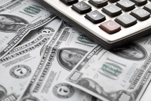 hesap makinesi ve para arka plan.