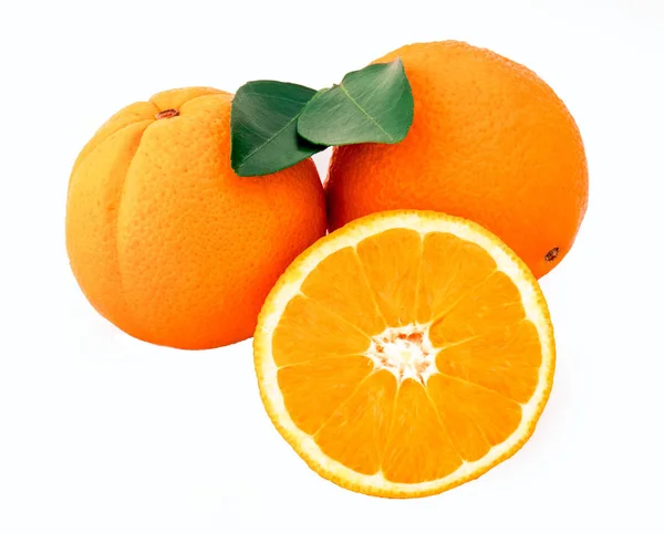 Three oranges close-up on the white background — Stock Photo, Image