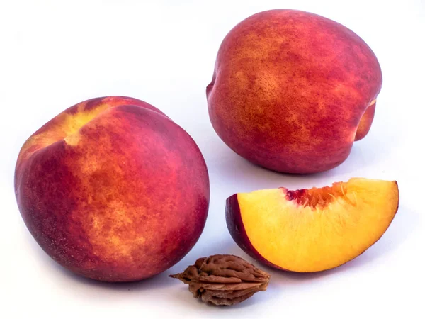 Group of nectarines on a white background. — Stock Photo, Image