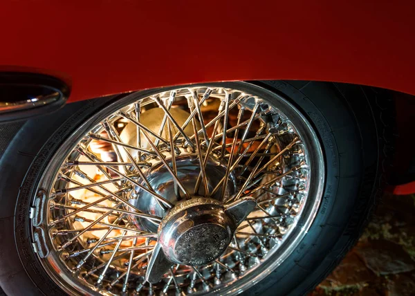 Background light illuminating wheel of a vintage car, Freiburg Classic