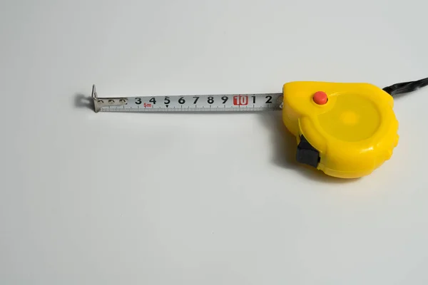 Een Gele Lintmeter Centimeters Witte Achtergrond — Stockfoto