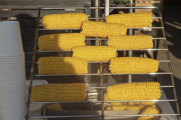 Sale of boiled corn, popular street food