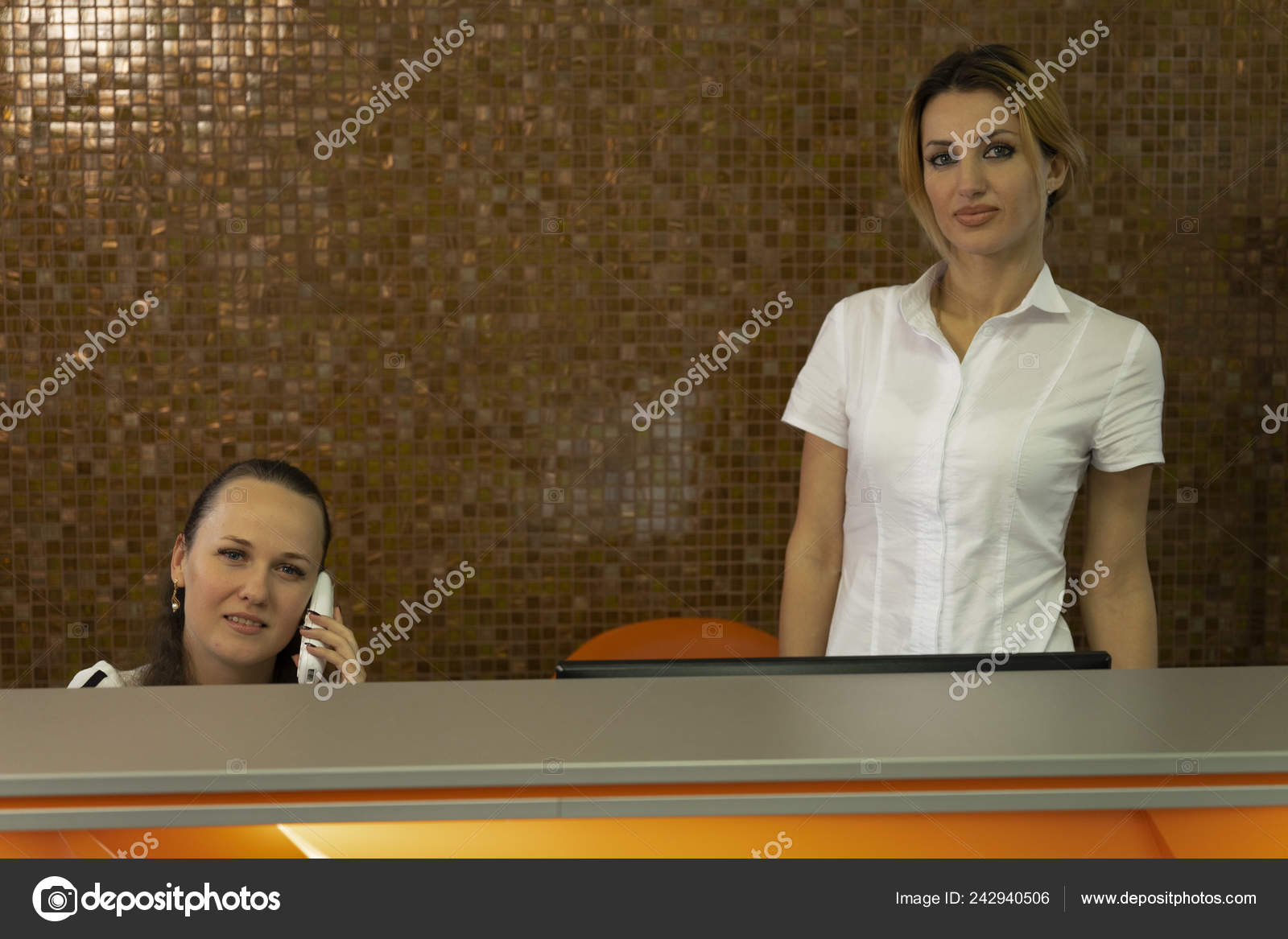 Medical Receptionists Working Front Desk Doctor Office Stock