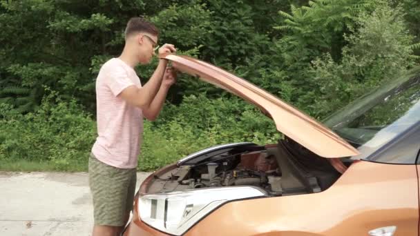 Vehicle Trouble Young Man Opens Hood Looking Rummaging Engine Man — Stock Video