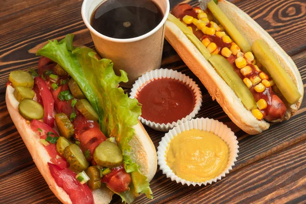 Two appetizing hotdog with mustard and ketchup, close up — Stock Photo, Image