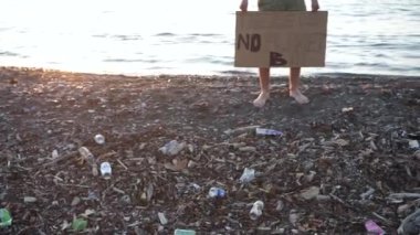 Young student holding poster with There is no planet B climate change, strike and protest youth