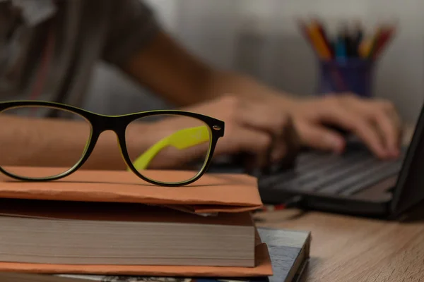 Concept of training and education, Books, textbooks, close-up glasses