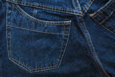 Denim. Kot pantolon arka planı. Kot pantolon desenli ya da kot pantolonlu. Mavi kot desenli..