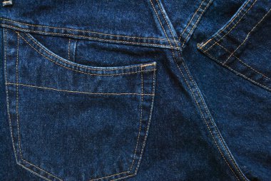 Denim. Kot pantolon arka planı. Kot pantolon desenli ya da kot pantolonlu. Mavi kot desenli..