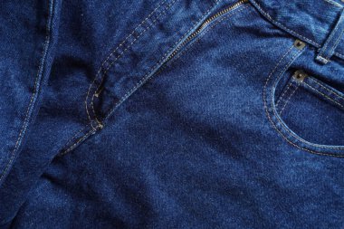 Denim. Kot pantolon arka planı. Kot pantolon desenli ya da kot pantolonlu. Mavi kot desenli..