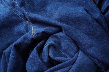 Denim. Kot pantolon arka planı. Kot pantolon desenli ya da kot pantolonlu. Mavi kot desenli..