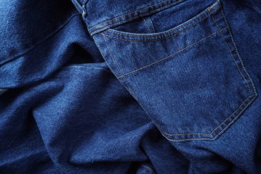 Denim. Kot pantolon arka planı. Kot pantolon desenli ya da kot pantolonlu. Mavi kot desenli..