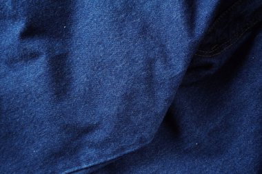 Denim. Kot pantolon arka planı. Kot pantolon desenli ya da kot pantolonlu. Mavi kot desenli..