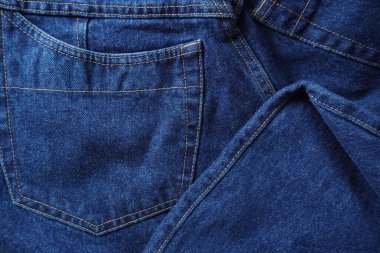 Denim. Kot pantolon arka planı. Kot pantolon desenli ya da kot pantolonlu. Mavi kot desenli..