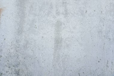 Arka plan ya da duvar kağıdı olarak pürüzsüz gri beton duvar dokusu. Sert desenli beton duvarı kapatın. Çimento dokusu.