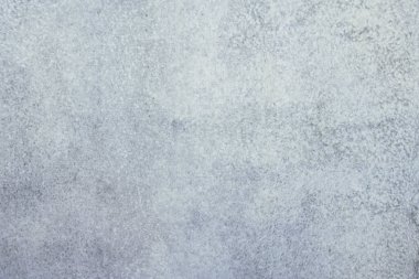 Arka plan ya da duvar kağıdı olarak pürüzsüz gri beton duvar dokusu. Sert desenli beton duvarı kapatın. Çimento dokusu.