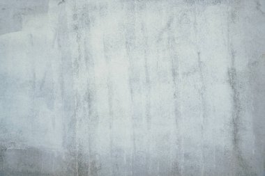 Arka plan ya da duvar kağıdı olarak pürüzsüz gri beton duvar dokusu. Sert desenli beton duvarı kapatın. Çimento dokusu.