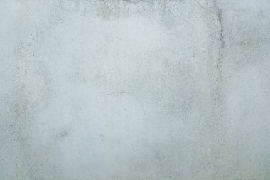 Arka plan ya da duvar kağıdı olarak pürüzsüz gri beton duvar dokusu. Sert desenli beton duvarı kapatın. Çimento dokusu.