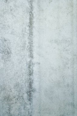 Arka plan ya da duvar kağıdı olarak pürüzsüz gri beton duvar dokusu. Sert desenli beton duvarı kapatın. Çimento dokusu.
